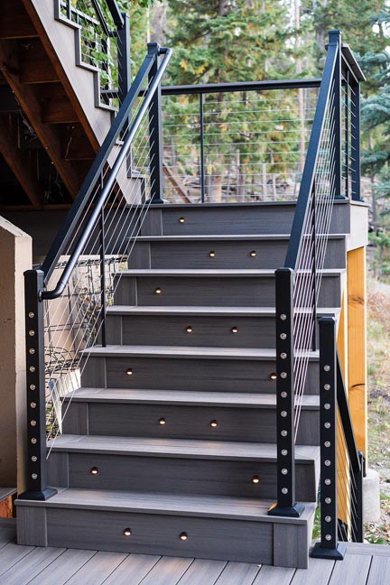custom deck with stairs and cable rail