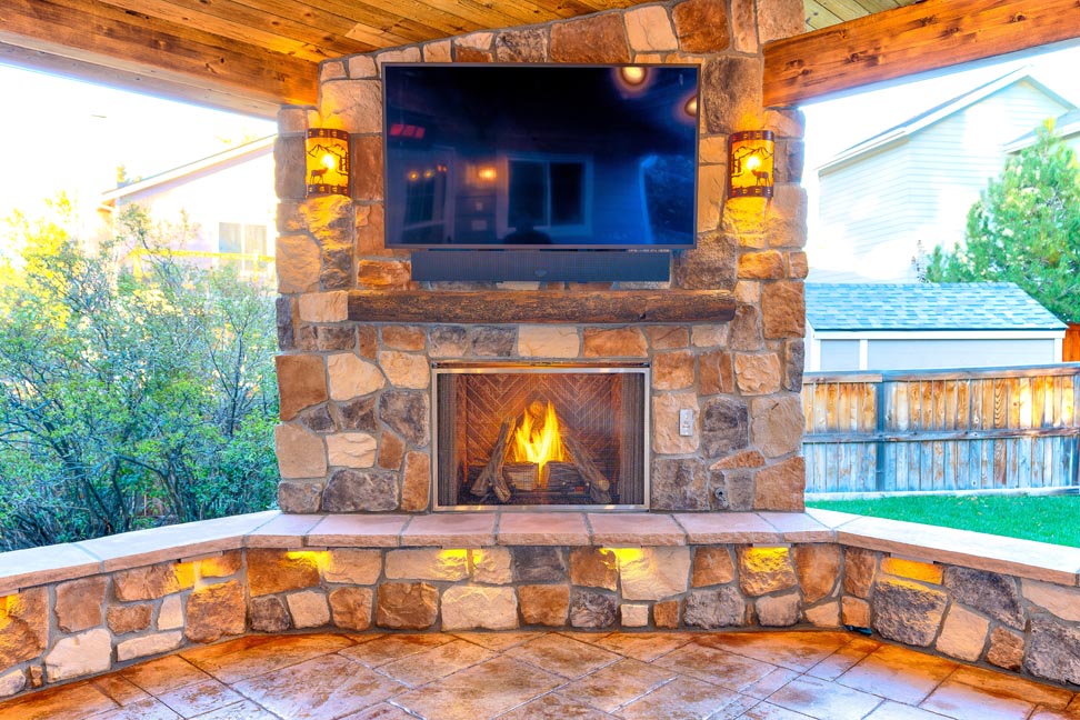 Patio with outdoor fireplace