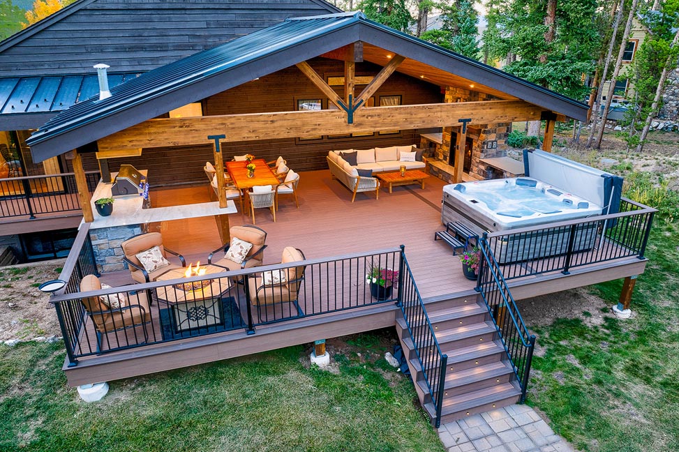 Outdoor living space with covered deck in Colorado foothills