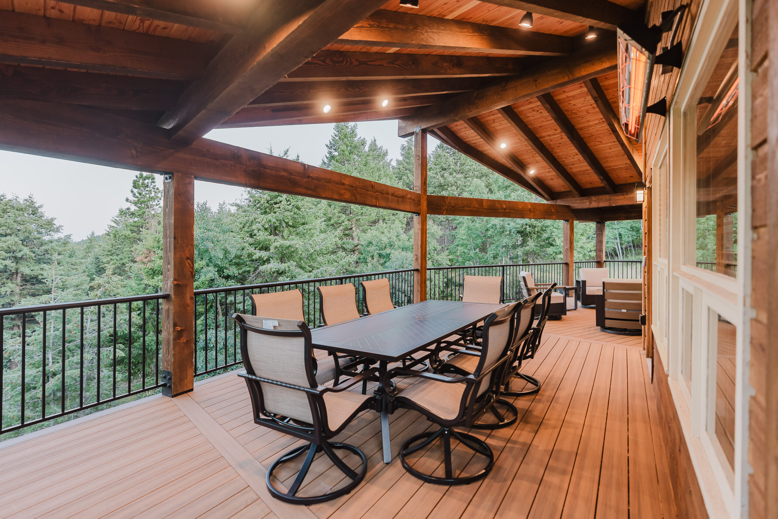 Covered patio protecting outdoor living area from snow